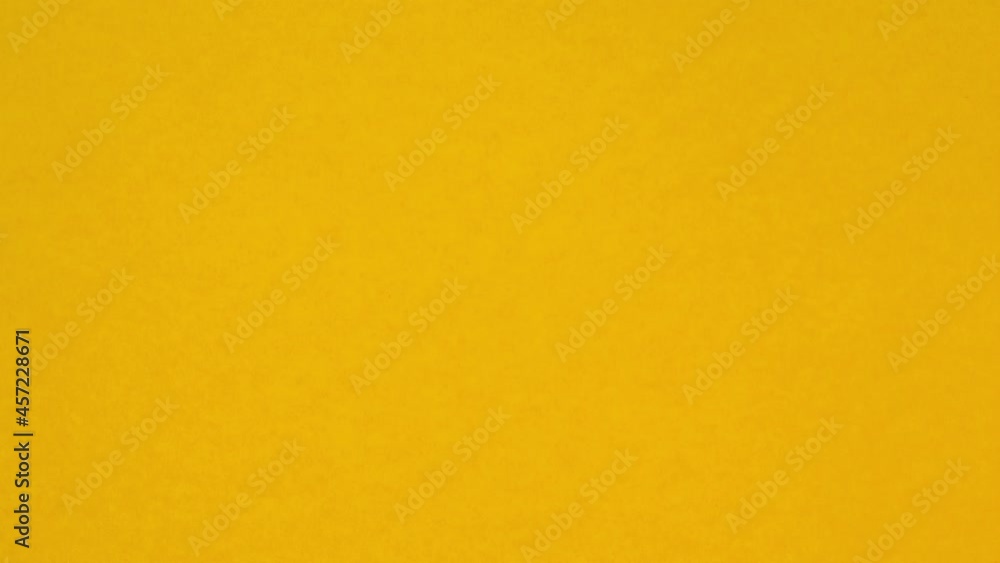 Looped stop motion animation with orange and pink background. A paper ball spreads making a blank sheet for text Looped stop motion animation with orange and pink background. A paper ball spreads making a blank sheet for text