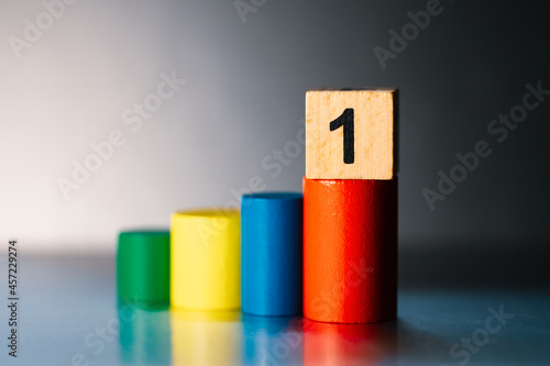 Wooden block number one on stage using as business competition concept