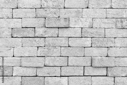 Wall white brick wall texture background. Brickwork or stonework flooring interior rock old pattern clean concrete grid uneven bricks design stack walls. Square white brick wall background