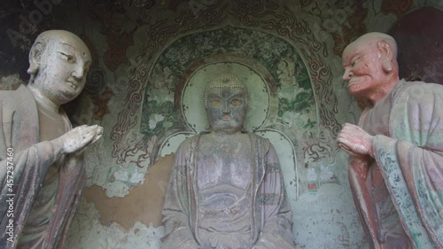 Buddhist monk statues at Maijishan Grottoes in Tianshui, Gansu, China photo