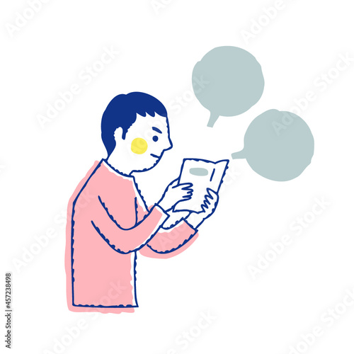 説明書を真剣に読んでいる男性　フキダシ