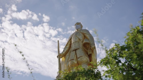 Oda Nobunaga standing over Gifu holding rifle, Historic Feudal Lord, Japan photo