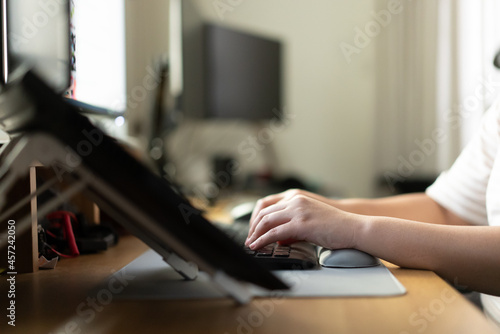 Close up of human hand working typing on computer keyboard 