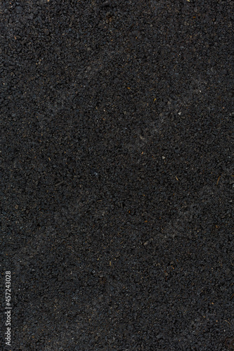 A black asphalt texture background
