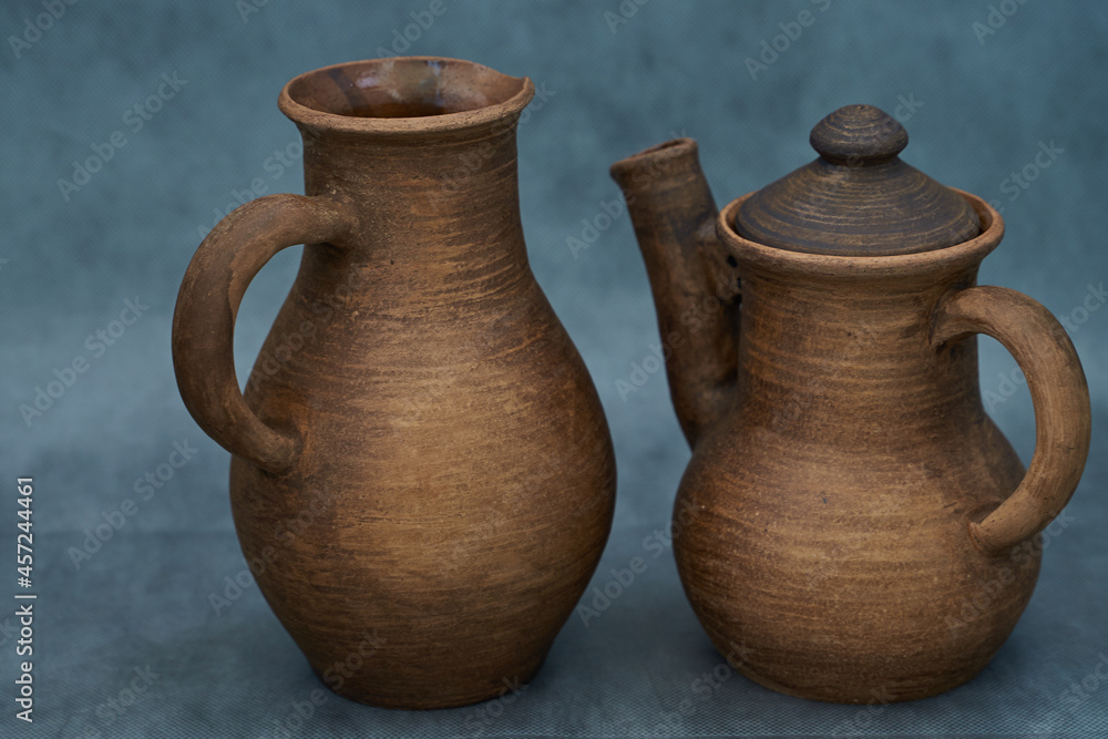 Ceramics, a ceramic product made with your own hands, made on a potter's wheel, a jug, a mug Ceramics, a ceramic product made with your own hands, made on a potter's wheel, a jug, a mug