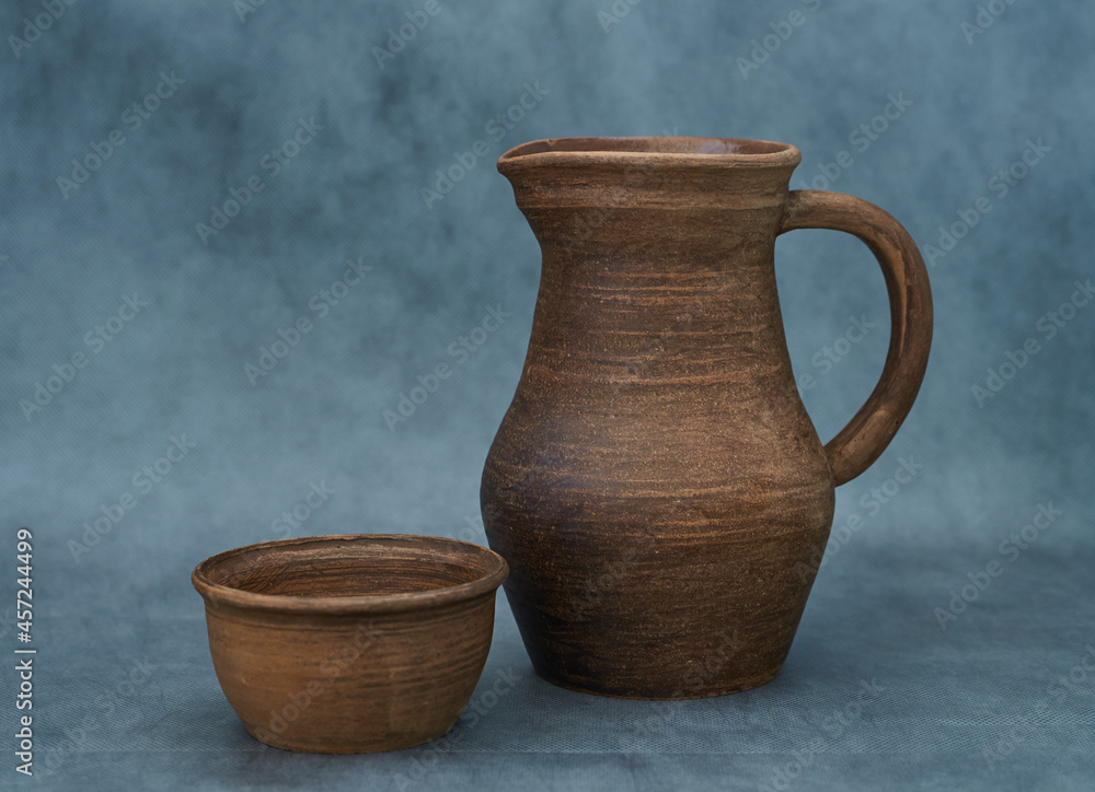 Ceramics, a ceramic product made with your own hands, made on a potter's wheel, a jug, a mug Ceramics, a ceramic product made with your own hands, made on a potter's wheel, a jug, a mug