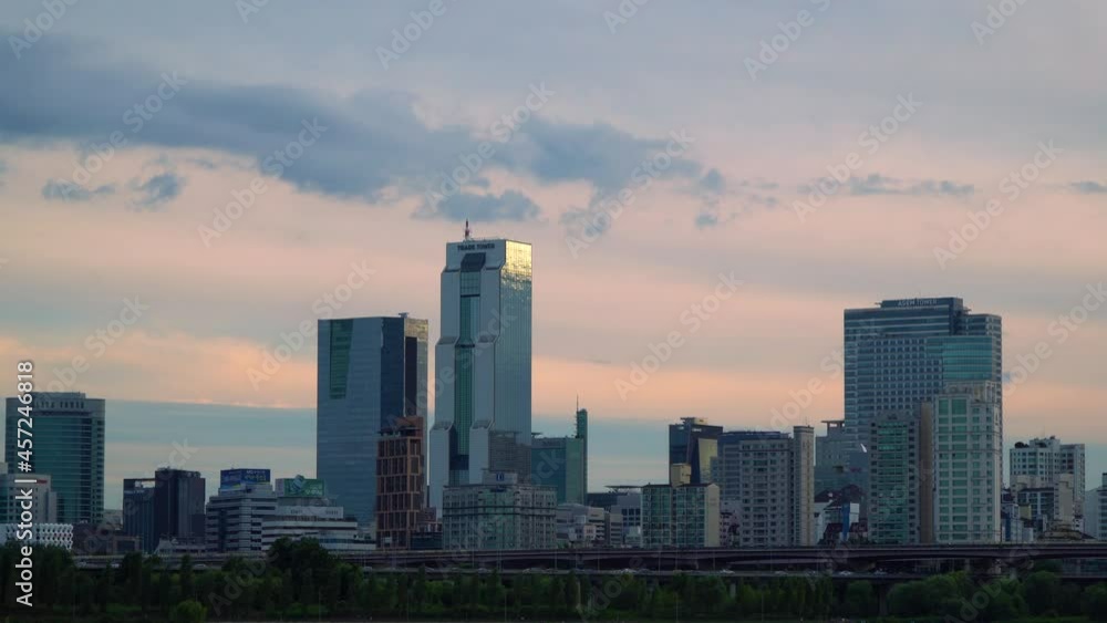 Scenery Of Towers And High Rise Buildings With Traffic Over Han River Seoul Metropolitan City, Gangnam Districts, Korea. Static Shot Scenery Of Towers And High Rise Buildings With Traffic Over Han River Seoul Metropolitan City, Gangnam Districts, Korea. Static Shot