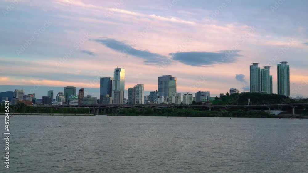 Waterfront Cityscape With Towers And High Rise Buildings In Han River, Seoul, South Korea. Static Waterfront Cityscape With Towers And High Rise Buildings In Han River, Seoul, South Korea. Static