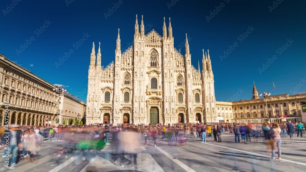 Milan Cathedral Hyperlapse Time lapse. People walking on Square Piazza Duomo di Milano and Gallery Vittorio Emanuele II, during the fashion week timelapse city. Milan Cathedral Hyperlapse Time lapse. People walking on Square Piazza Duomo di Milano and Gallery Vittorio Emanuele II, during the fashion week timelapse city.