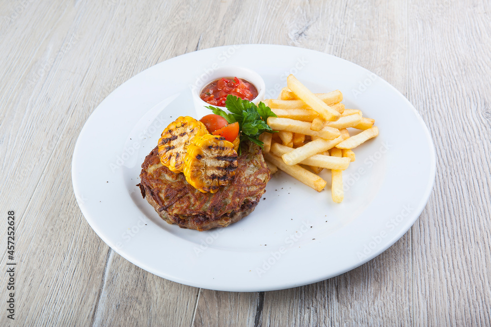 beefsteak with french fries corn and sauce beefsteak with french fries corn and sauce