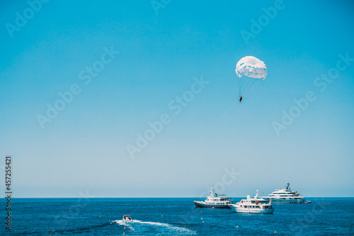 Parasailing in open sea. Water sports