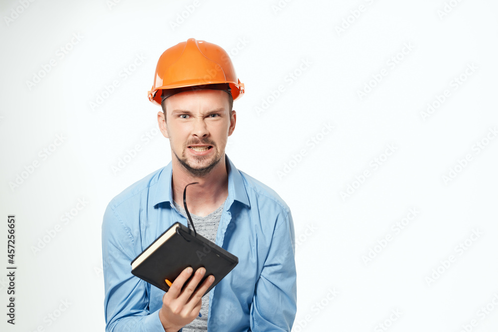 man in orange helmet protection Working profession man in orange helmet protection Working profession