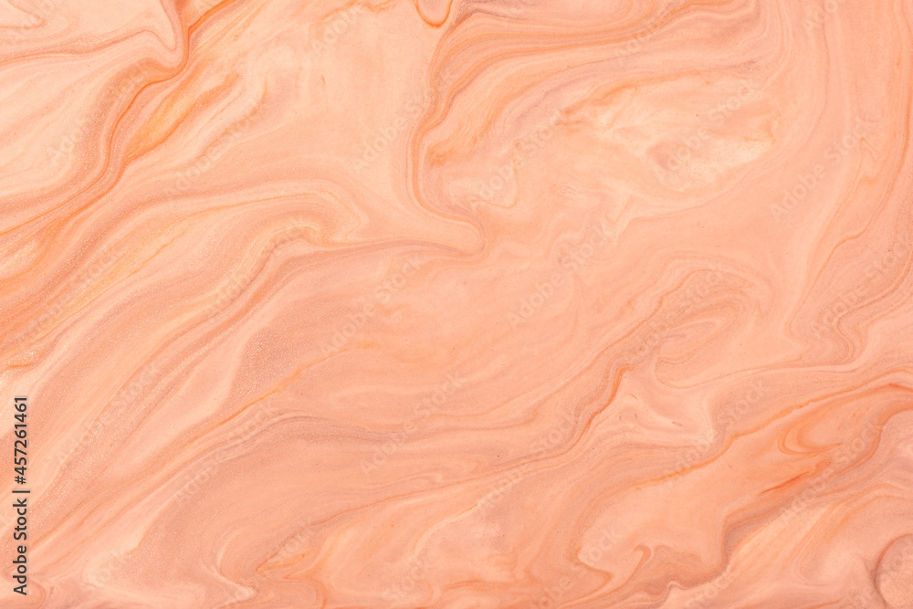 Abstract fluid art background light coral colors. Liquid marble. Acrylic painting with peach gradient and splash.
