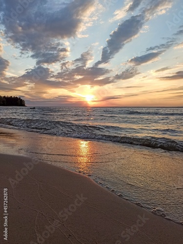 Fototapeta Naklejka Na Ścianę i Meble -  sunset reflection on wet sand
