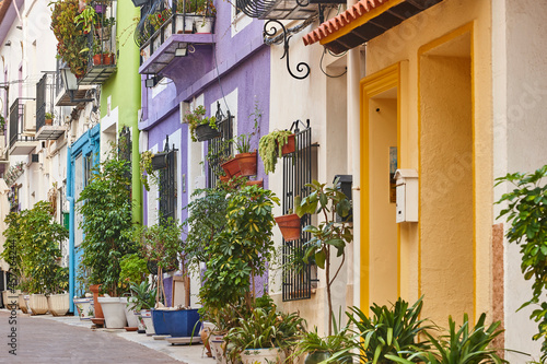 Picturesque colored facades in Calpe old town. Mediterranean coast. Alicante