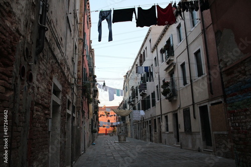 Fototapeta Naklejka Na Ścianę i Meble -  Some laundry hanging in the streets in Italy
