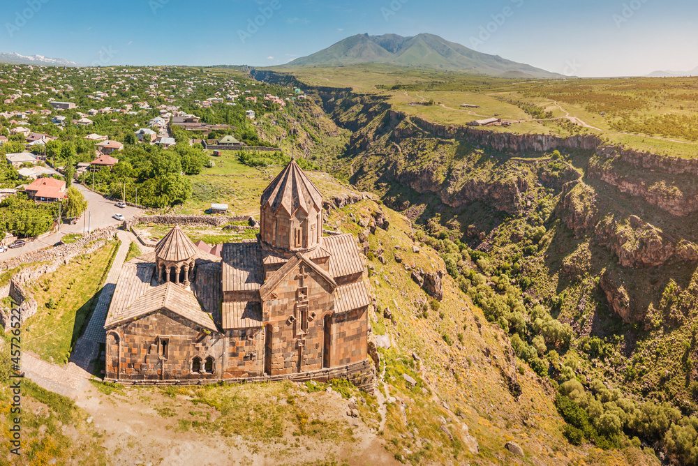Aerial view of Hovhannavank monastery and church on the edge of a scenic Kasakh gorge and canyon. Travel and religious destinations and attractions in Armenia