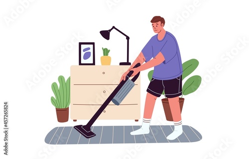 Young man cleaning floor and carpet with cordless vacuum cleaner. Person doing home cleanup using domestic appliance in apartment room. Colored flat vector illustration isolated on white background