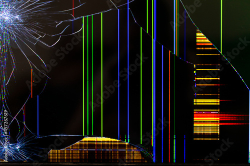 broken tv screen with color bright stripes close up