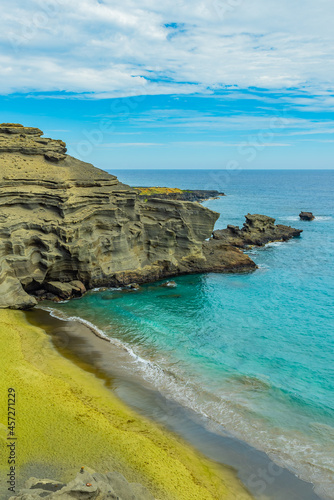 Beautiful view of Papakolea green sand beach on big island of Hawaii, USA. vertical photo