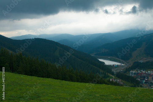 View of the mountains and the evening sky from the meadow