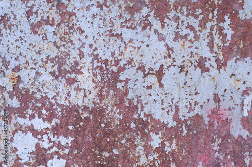 Old peeling paint. Rusty metal. Rusty iron structure.