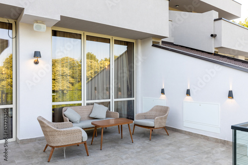 Empty terrace hotel restaurant with sun shades