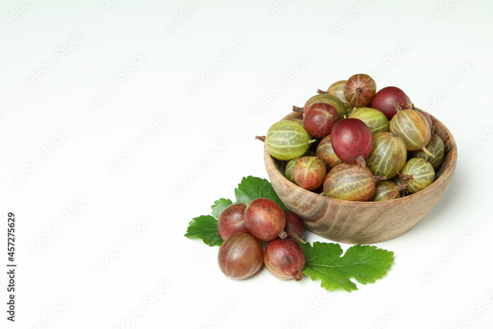 Bowl of ripe gooseberry on white background Bowl of ripe gooseberry on white background