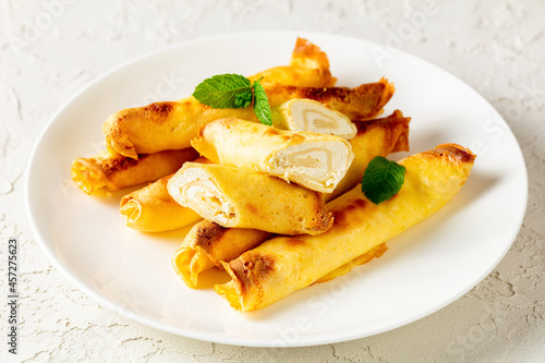 blintz, rolled filled with cottage cheese pancakes