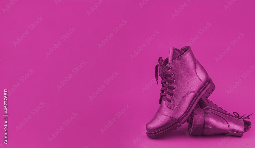 Pink shoes on a pink background. Leather shoe banner. Stylish boot. Boots. Winter and spring off-season boots. Stylish boot isolated. Close-up. Laces, tractor sole. Casual style. Copy space Pink shoes on a pink background. Leather shoe banner. Stylish boot. Boots. Winter and spring off-season boots. Stylish boot isolated. Close-up. Laces, tractor sole. Casual style. Copy space
