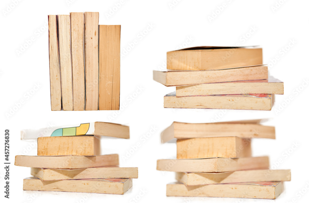 set of stacks of books arranged horizontally on white background set of stacks of books arranged horizontally on white background