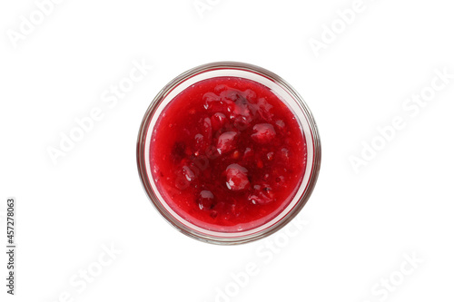 Glass with cranberry sauce isolated on white background