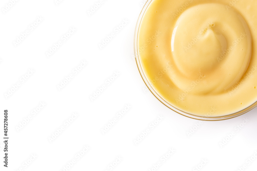 Pastry cream in a bowl isolated on white background. Top view. Copy space Pastry cream in a bowl isolated on white background. Top view. Copy space