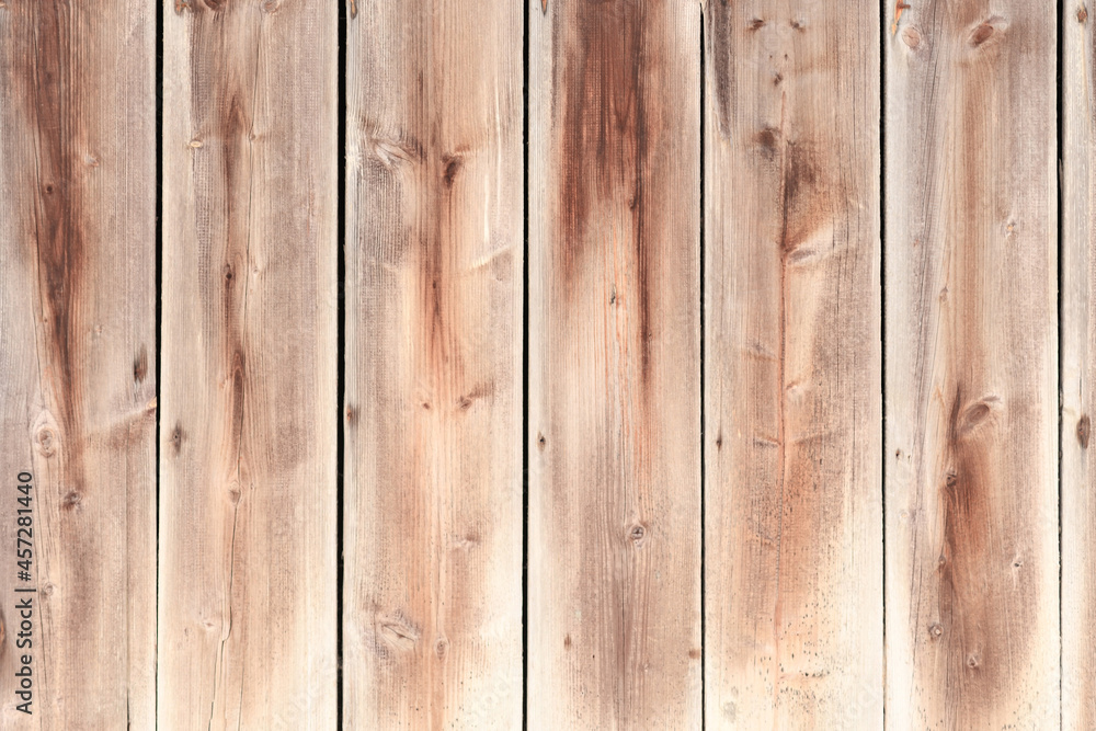 Fototapeta premium Vertical light brown wooden planks background