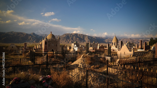 Panorama view to muslim cemetery Semiz Bel at Kochkor in Naryn, Kyrgyzstan photo