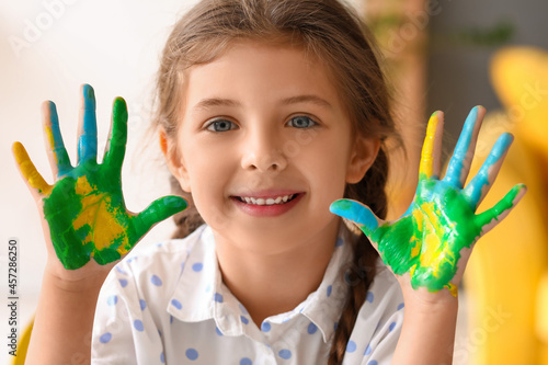 Cute little girl with hands...