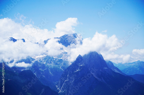 Wank mountain peaks near Garmisch-Partenkirchen  Bavaria. View from above of the surrounding landscape with mountains.