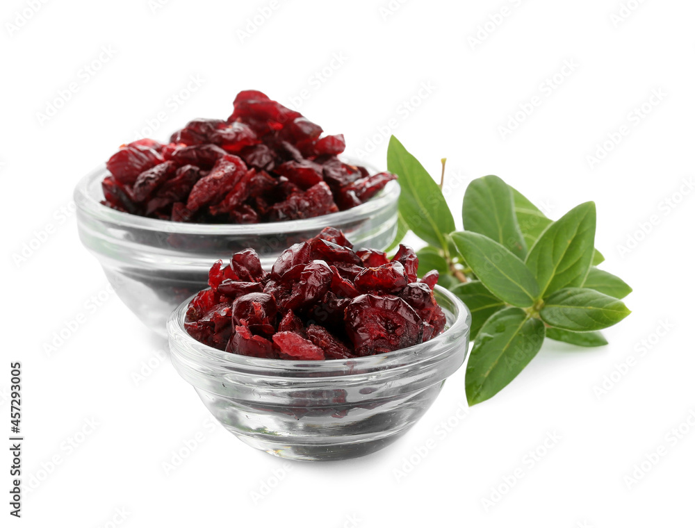 Bowls with tasty dried cranberries on white background Bowls with tasty dried cranberries on white background