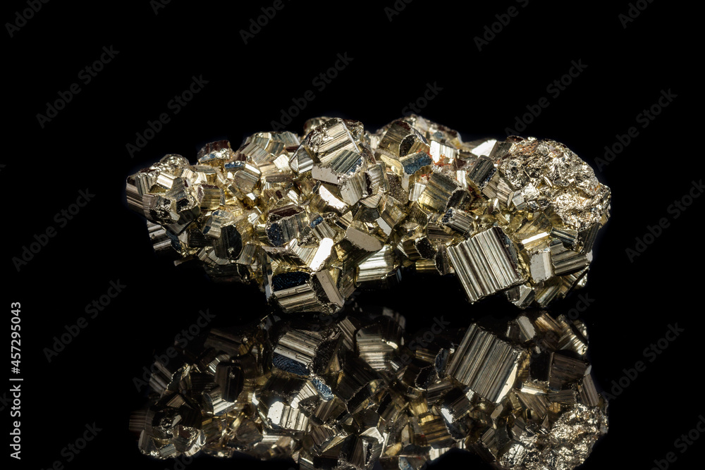 Macro mineral stone Pyrite on a black background Macro mineral stone Pyrite on a black background