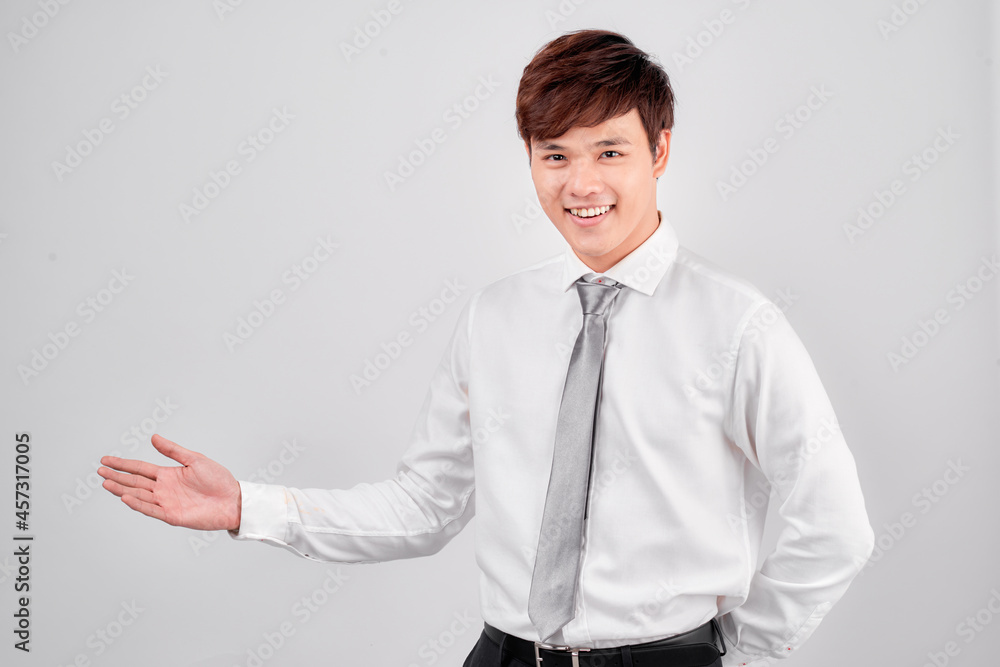 young business man holding something on his hand young business man holding something on his hand