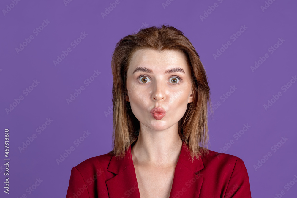 Half-length portrait of young girl isolated on purple, lilac color studio background. Concept of human emotions, facial expression, cosmetics, youth Half-length portrait of young girl isolated on purple, lilac color studio background. Concept of human emotions, facial expression, cosmetics, youth