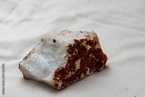 Yellow-white crystal stone from India on a white background