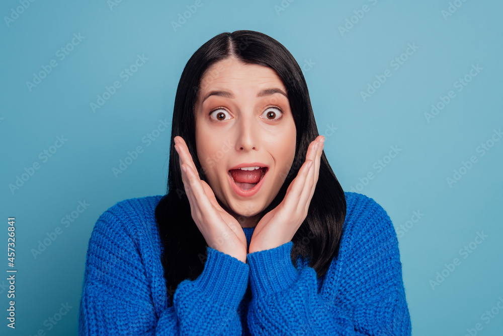Portrait of astonished girl hear unbelievable novelty impressed stare stupor wear casual style outfit isolated over blue color background Portrait of astonished girl hear unbelievable novelty impressed stare stupor wear casual style outfit isolated over blue color background