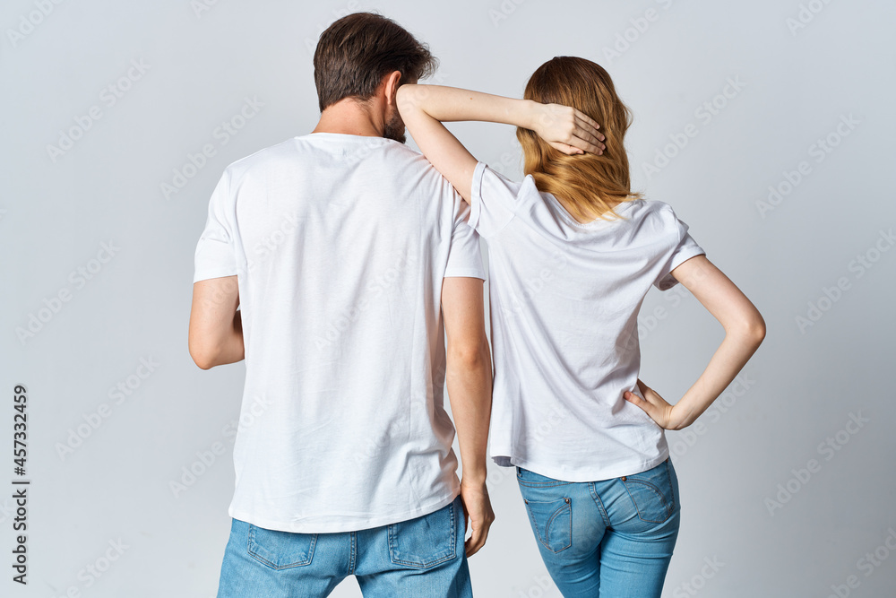 man and woman in white t-shirts and jeans design casual clothing mockup man and woman in white t-shirts and jeans design casual clothing mockup