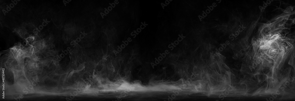 Panoramic view of the abstract fog. White cloudiness, mist or smog moves on black background. Beautiful swirling gray smoke. Mockup for your logo. Wide angle horizontal wallpaper or web banner. - obrazy, fototapety, plakaty 