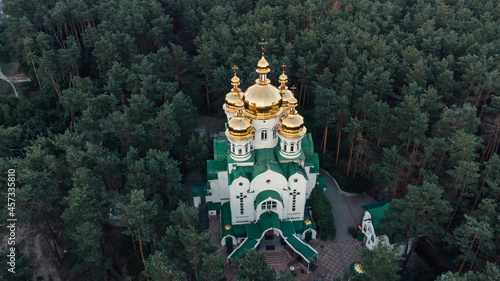 Temple of the Holy Martyrs Andrian and Natalia on the Forest in the city of Kyiv, Ukraine photo