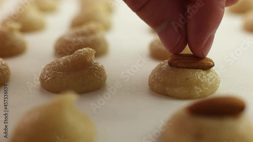 Cookie making. With Almonds. Handmade. In the kitchen. Close-up. photo