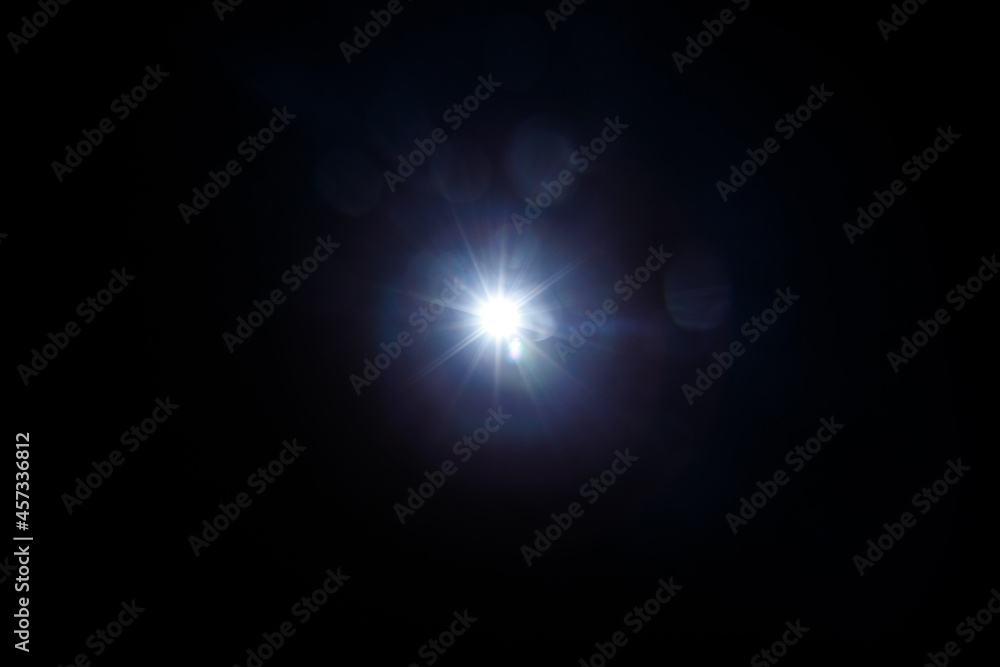 Easy to add lens flare effects for overlay designs or screen blending mode to make high-quality images. Abstract sun burst, digital flare, iridescent glare over black background. Easy to add lens flare effects for overlay designs or screen blending mode to make high-quality images. Abstract sun burst, digital flare, iridescent glare over black background.