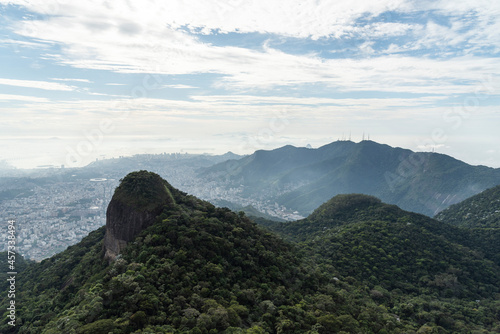 Beautiful view from mountain to green rainforest and city