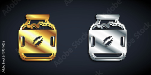 Gold and silver Coffee jar bottle icon isolated on black background. Long shadow style. Vector
